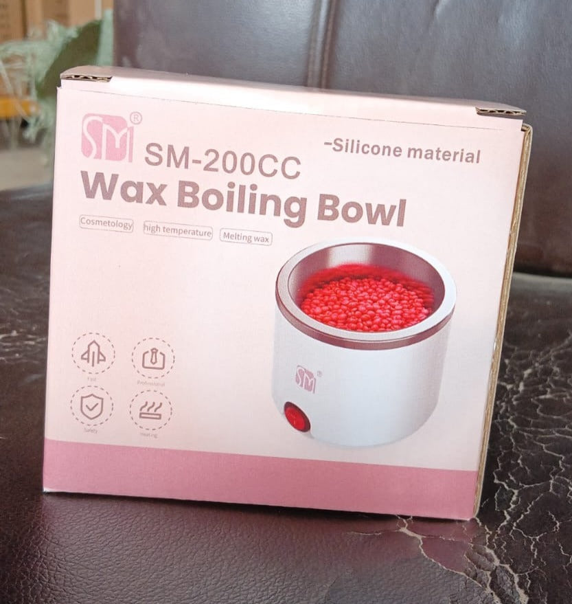 Retail packaging box for the Indo Glow electric wax heater.