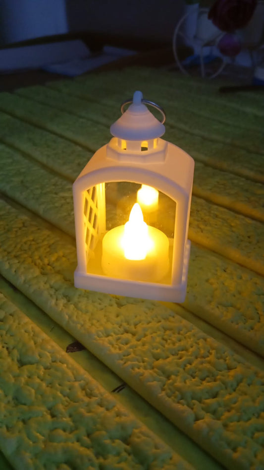 Arrangement of multiple flameless LED lanterns for a festive ambiance.