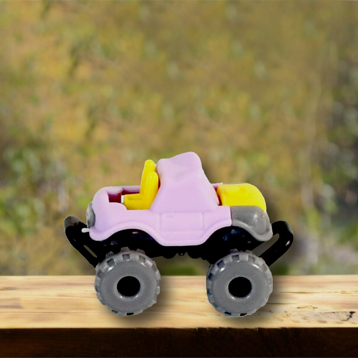 Different coloured friction powered monster trucks arranged to show the variety in the 30 Pcs Set.
