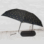 Compact umbrella with UV shield and zip case, displayed open for sun and rain protection.