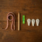 Complete 6-in-1 wall hanging measurement tool kit laid out on table