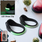 LED Shoe Clip Lights illuminating a runner's shoes at night for safety.