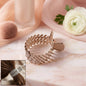 Elegant crystal-studded metal hair claw clip showing intricate design and sparkle