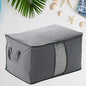 Organivo Quilted Storage Bag with clear window for organizing clothes and bedding.
