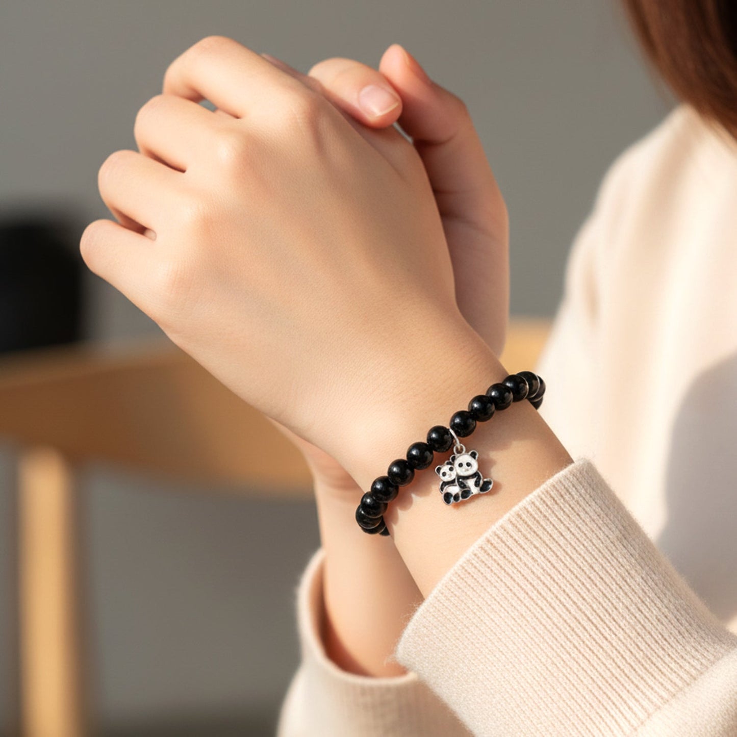 Elastic pastel bead bracelet for girls and women with decorative butterfly charm