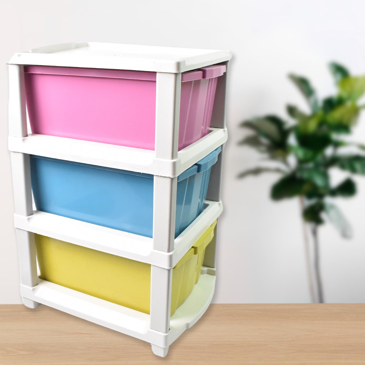Compact 3-tier plastic drawer unit effectively used for bathroom essentials.