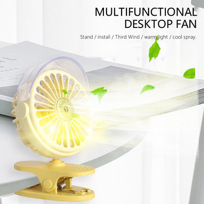The USB-powered Clip Desk Fan connected to a laptop, demonstrating convenient power options.