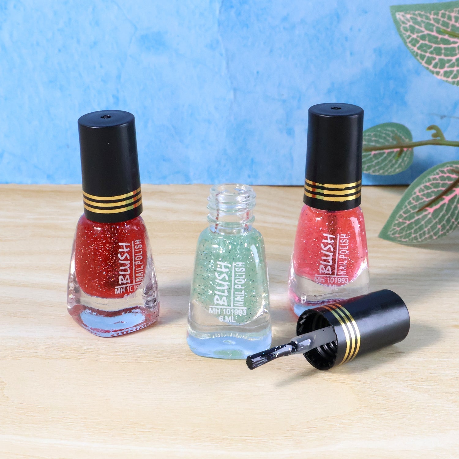 Mini nail polish bottle reflecting bright nail shine and sparkle