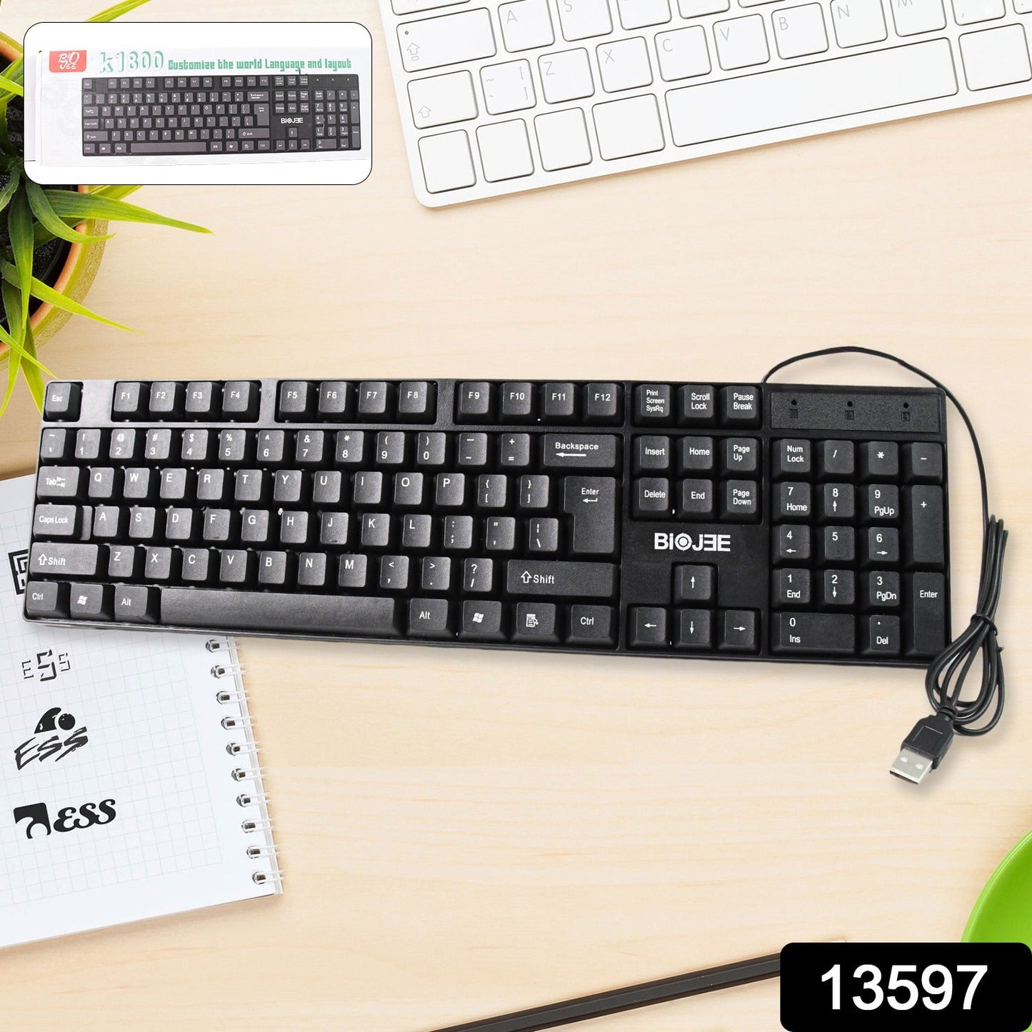 Side view of the ergonomic Wired USB Keyboard, highlighting its comfortable typing angle.