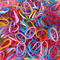 A neatly stacked pile of colorful multicolor rubber bands on a clean white background.
