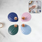 Set of four colorful self adhesive wall hooks for multipurpose use