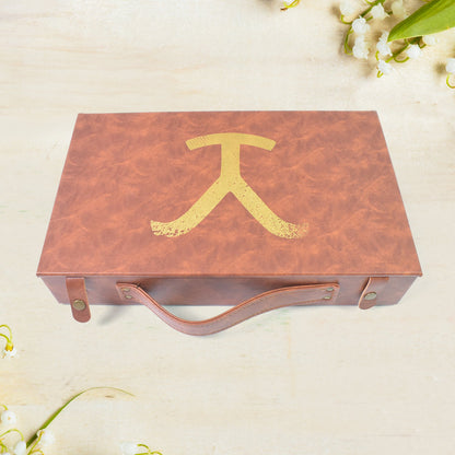 Stylish leather carrying case being held, demonstrating its portability and elegant appeal.