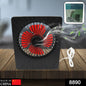Compact portable desk fan on a wooden table, powered by USB for versatile use.