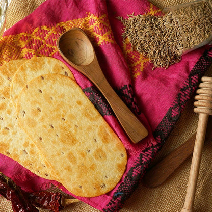 Maniarr's Carmonised Ragi Diet Thins in Jeera flavor, a healthy snack option.