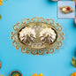 Double kumkum dish with ornate golden plastic tray for pooja rituals