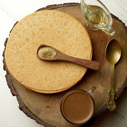 Close-up of a single round Plain Khakhra, showcasing its hand-roasted finish.