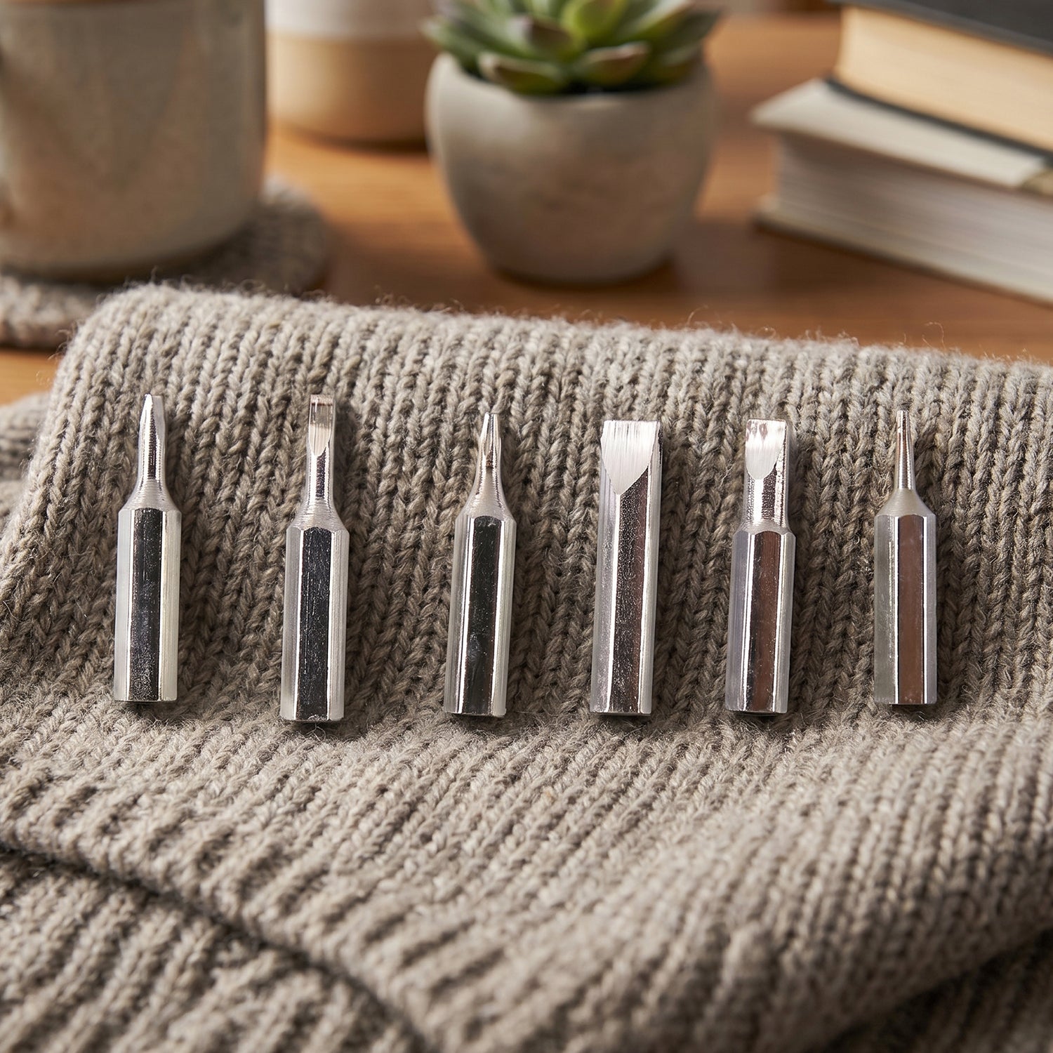 Close-up of precision screwdriver bits for detailed electronic repairs