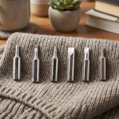 Close-up of precision screwdriver bits for detailed electronic repairs