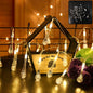 Crystal water drop LED string lights illuminating a festive indoor setting.