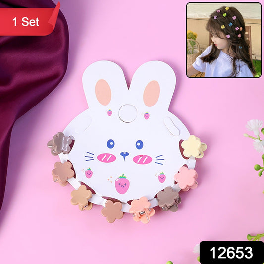 Mini hair claw clips arranged on a bunny-themed display card for kids