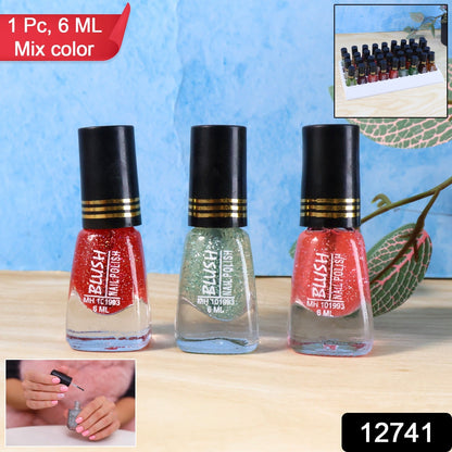 Close-up of vibrant glitter mini nail polish in mix colours
