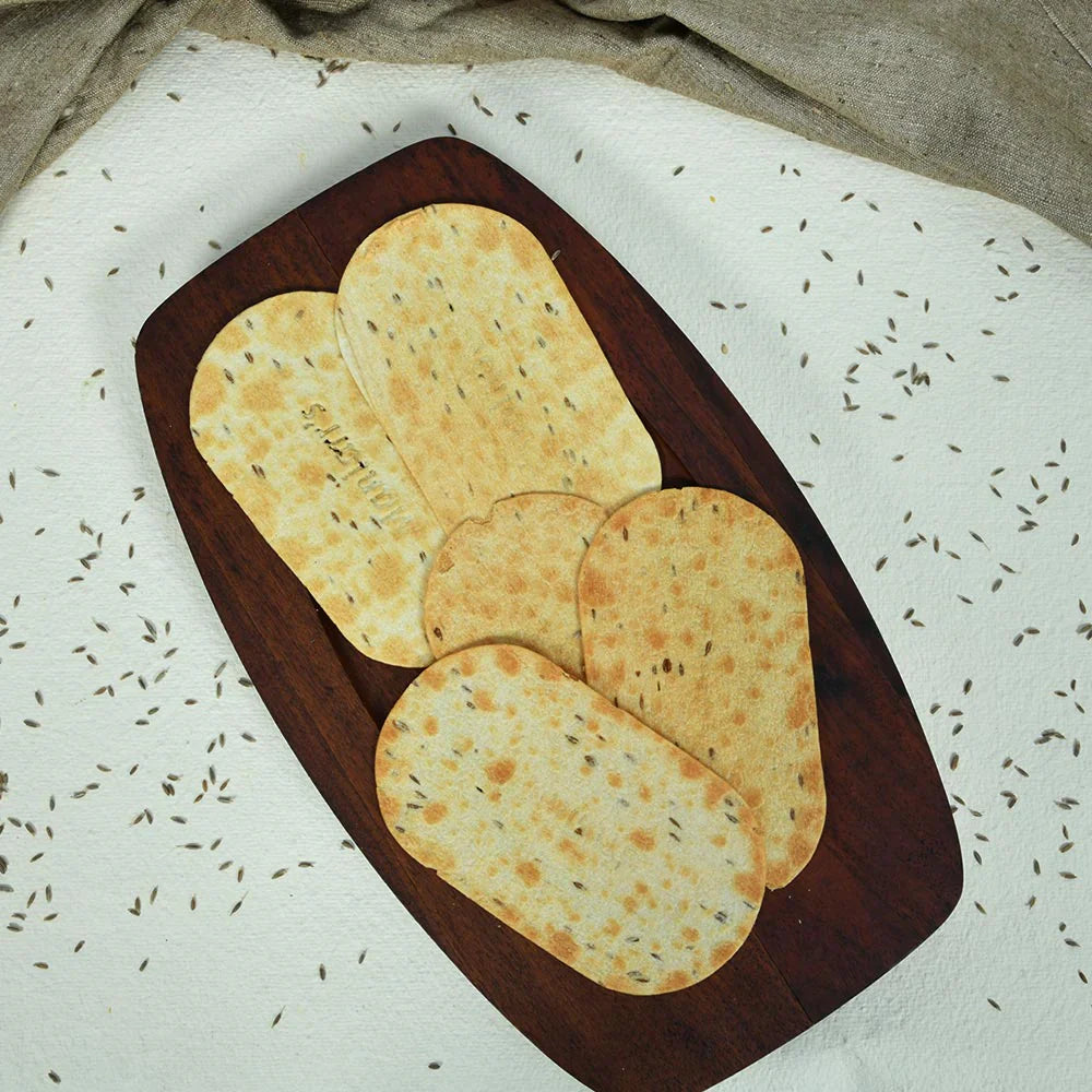 Packaged Khakhra wheat chips, ready for a quick and flavourful snack.